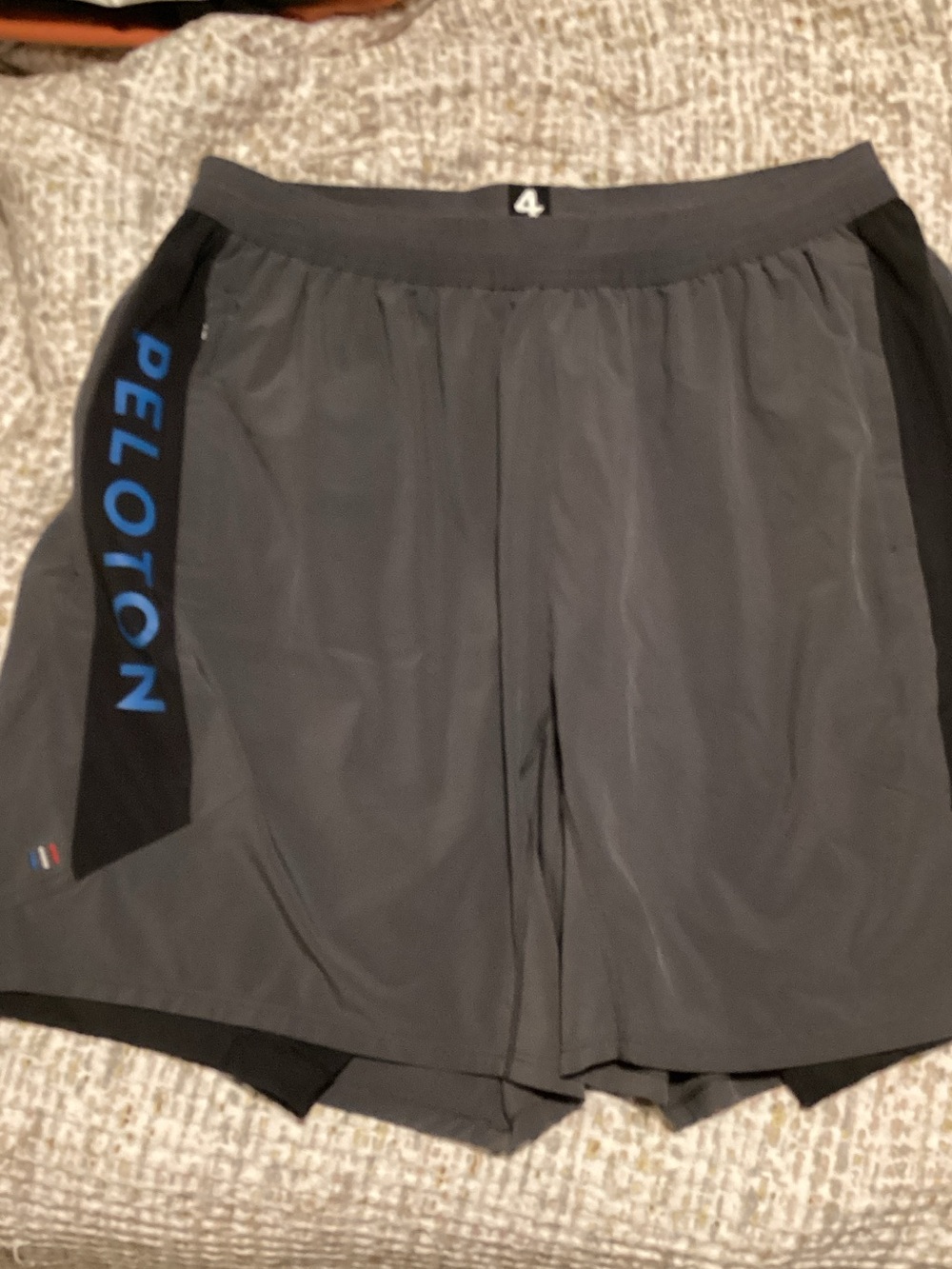 Peloton Men's Gray Athletic Shorts with Blue Logo